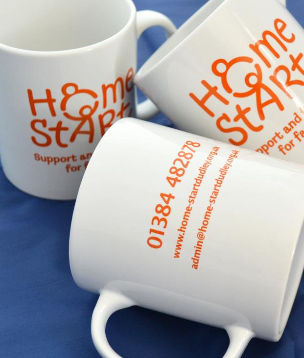 Branded white mugs with a 1 colour logo to each side