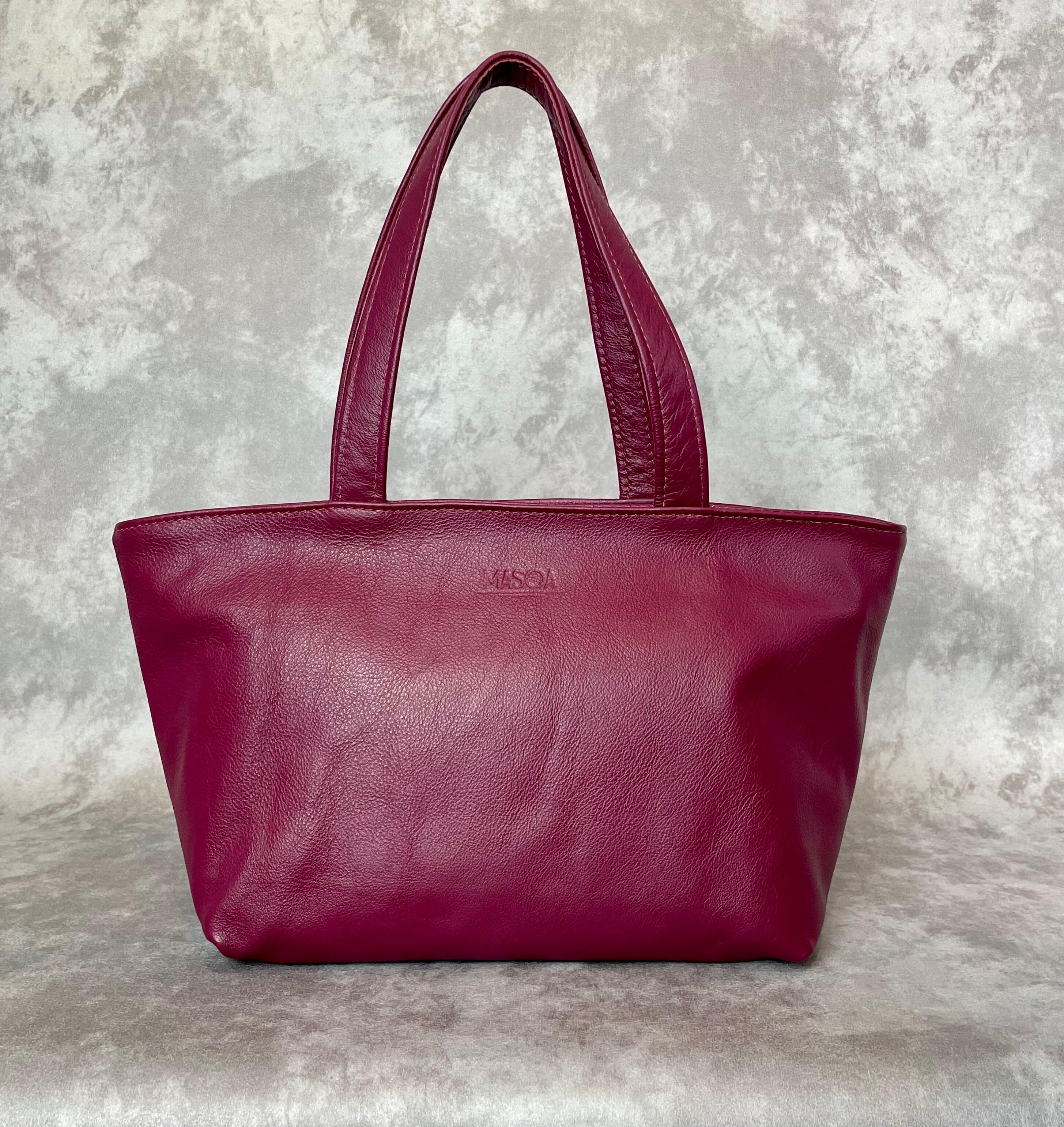 Pink leather tote handbag hotsell