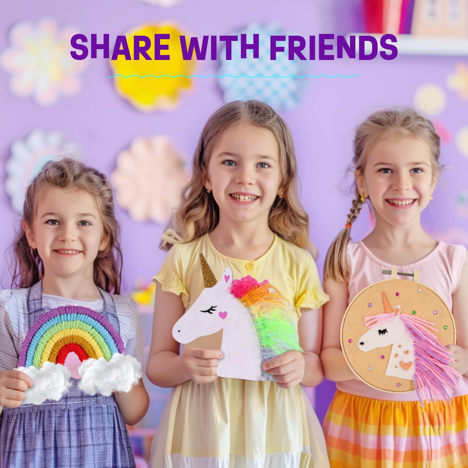 children-holding-unicorn-and-rainbow-from-kit.jpg