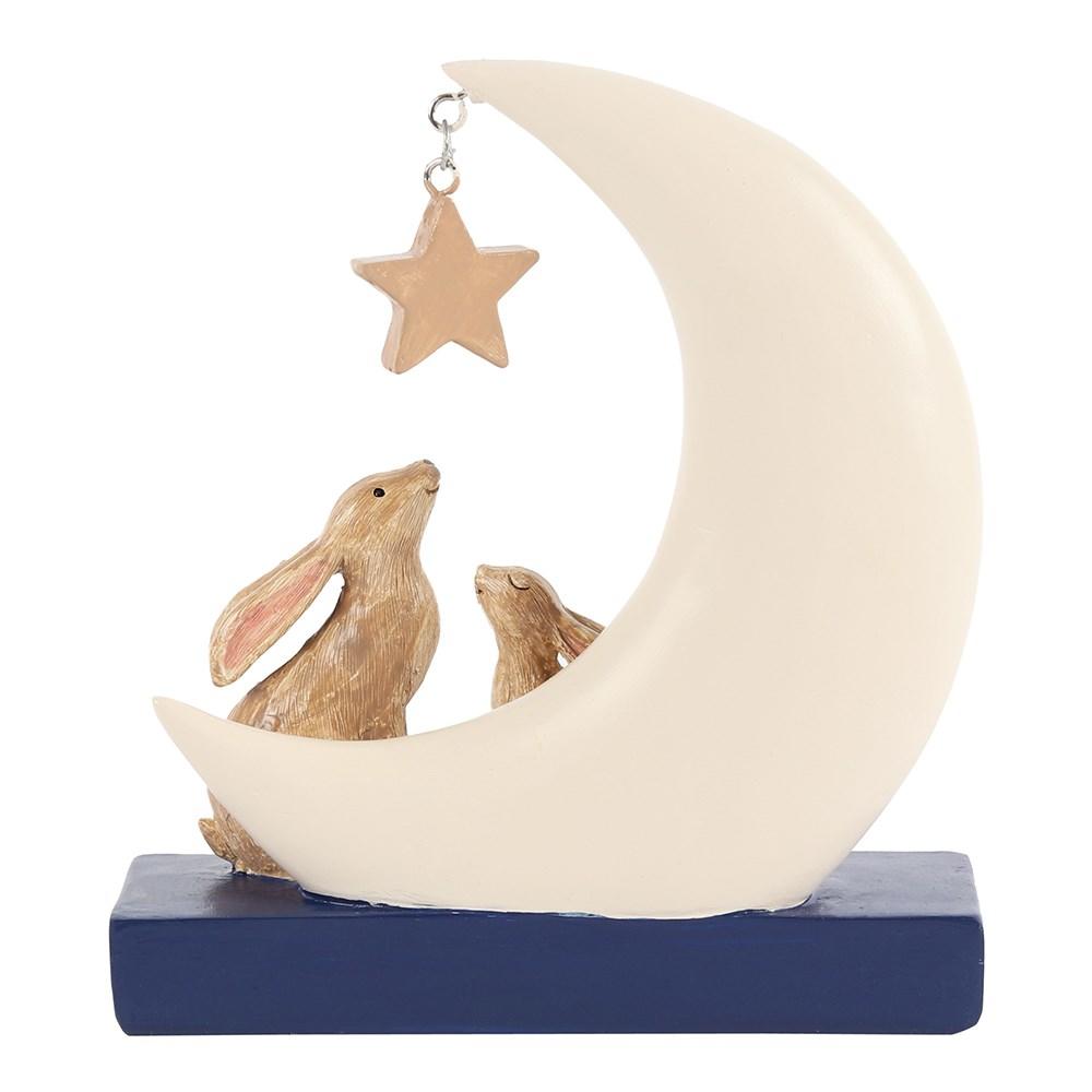 Navy and white resin ornament with two rabbits, stars and a moon that reads 'Love you to the stars & back', rear view.