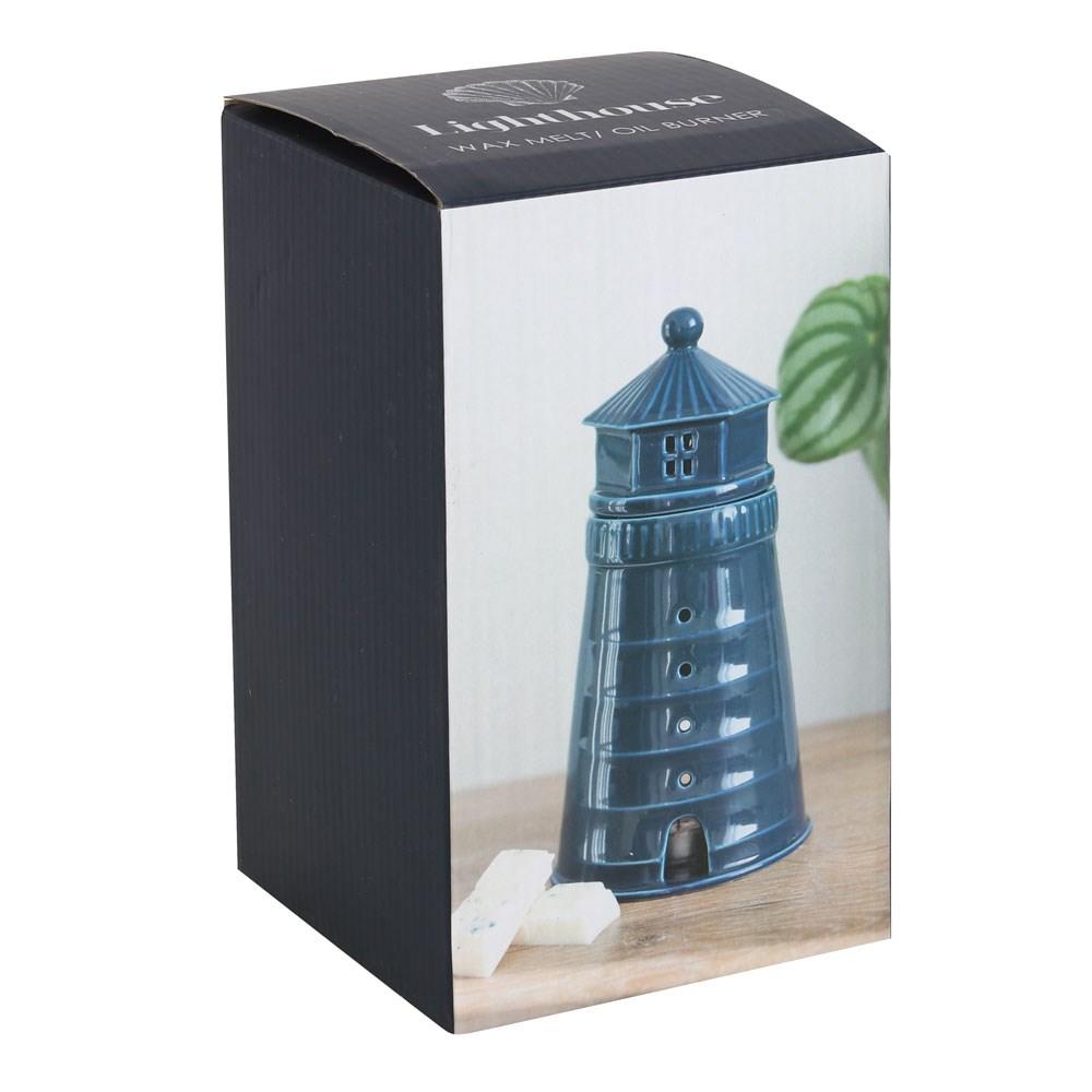 Blue light house lidded wax warmer and oil burner, shown in box.