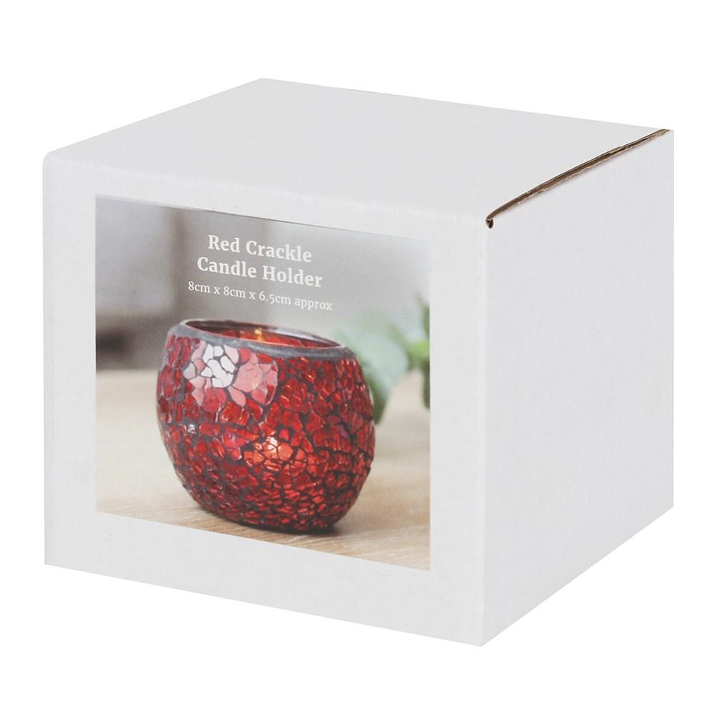 A single small red candle holder with a crackle effect and a subtle sparkle when it catches the light, shown in box.