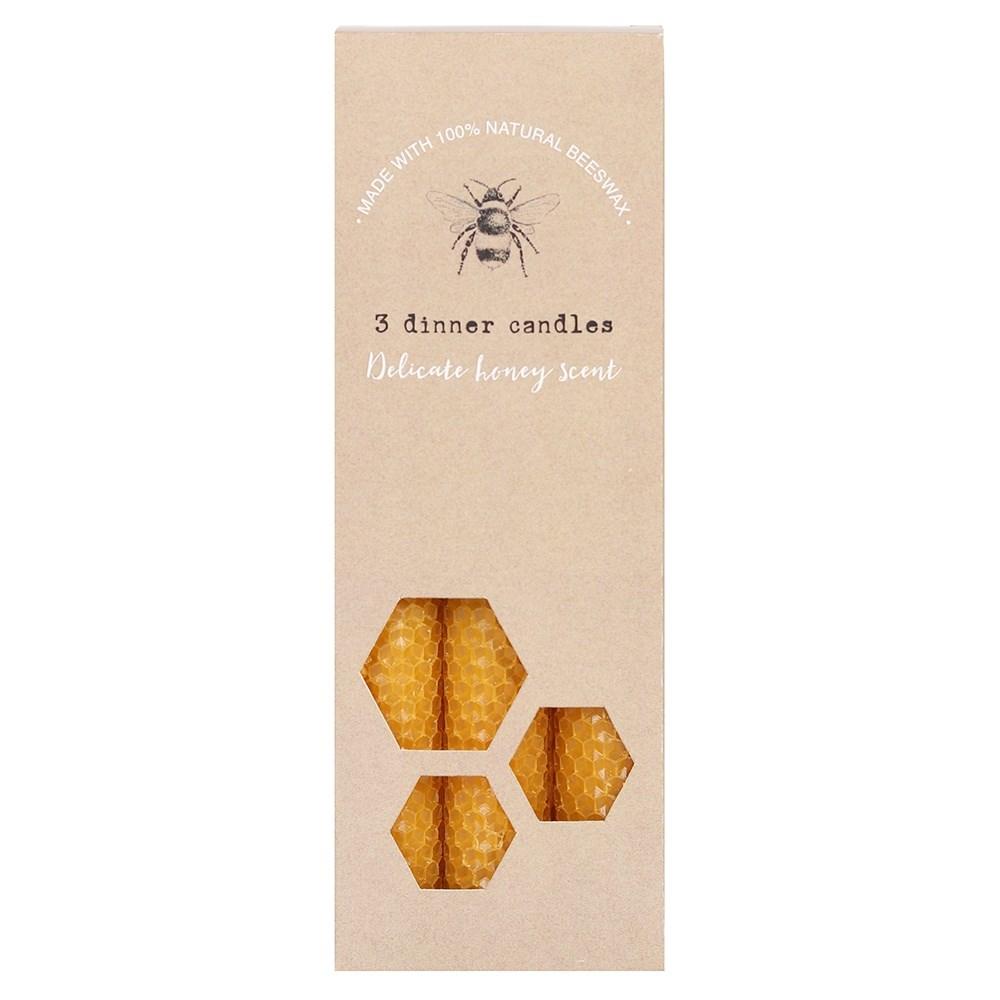 Set of three 100% natural beeswax dinner candles in a rolled honeycomb texture with a delicate honey scent.