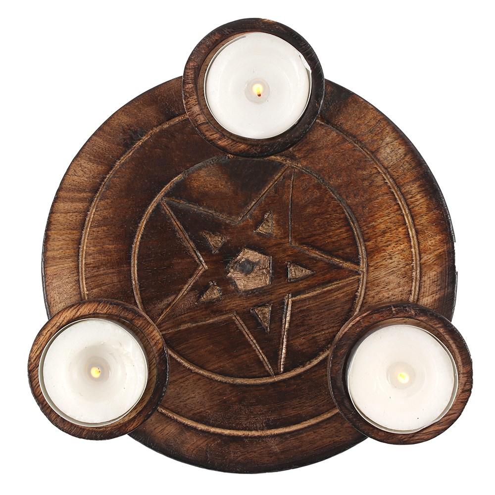 Lovely wooden tealight candle holder featuring a pentagram star design, with three lit tealights.