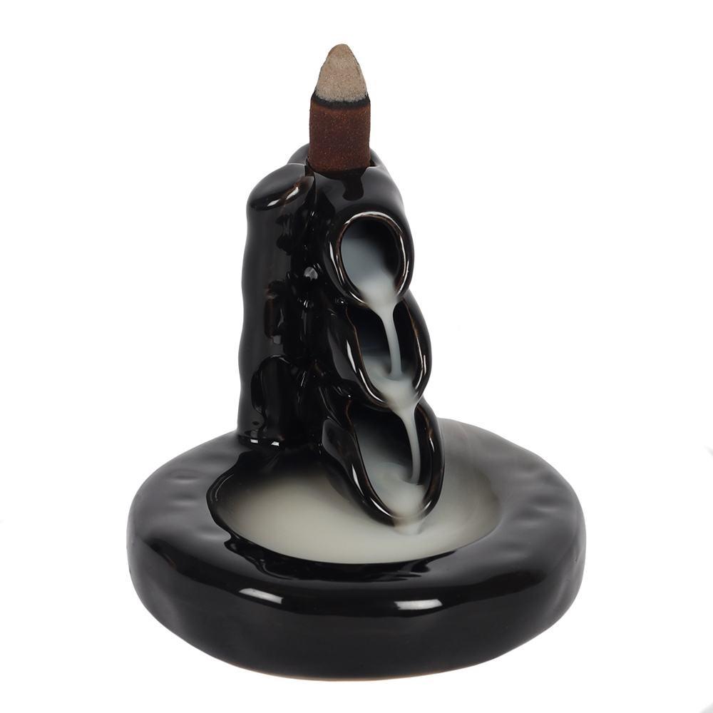 Backflow incense burner, black ceramic bamboo waterfall design. The smoke cascades down in a waterfall effect to the pool.