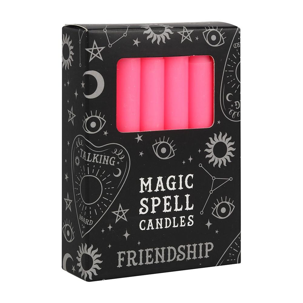 Pack of 12 pink 'friendship' spell candles, use with rituals to attract friendship and emotional well-being.