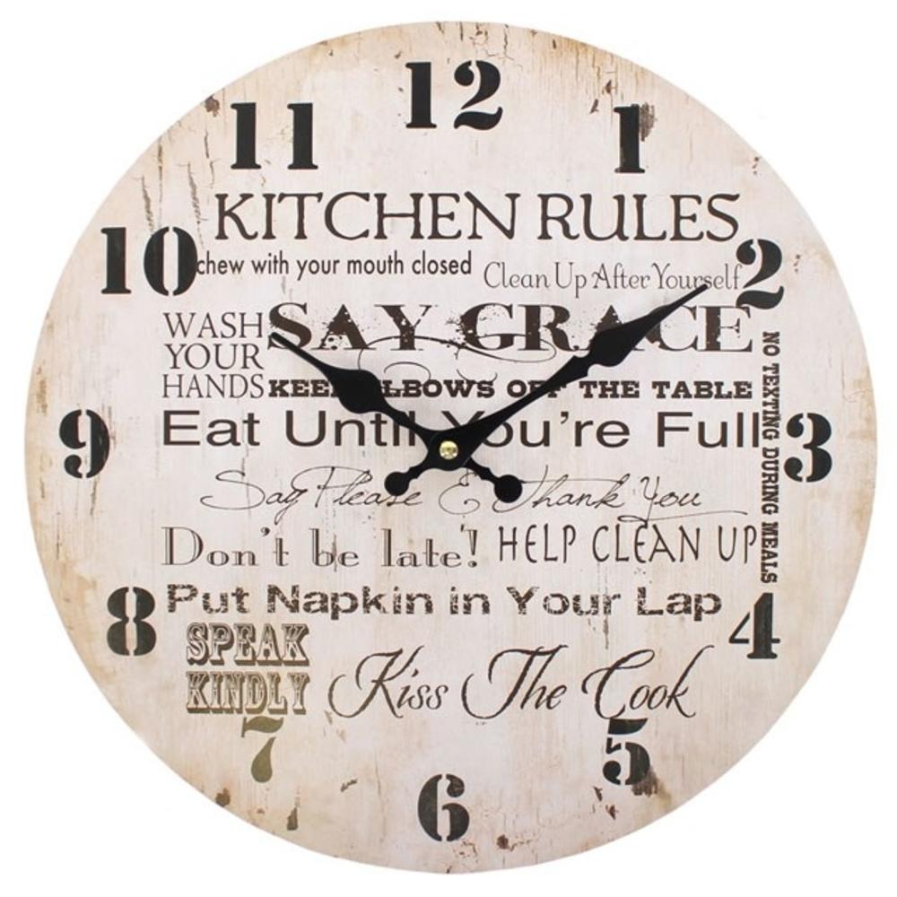 A rustic style MDF black and white wall clock with a kitchen rules design.