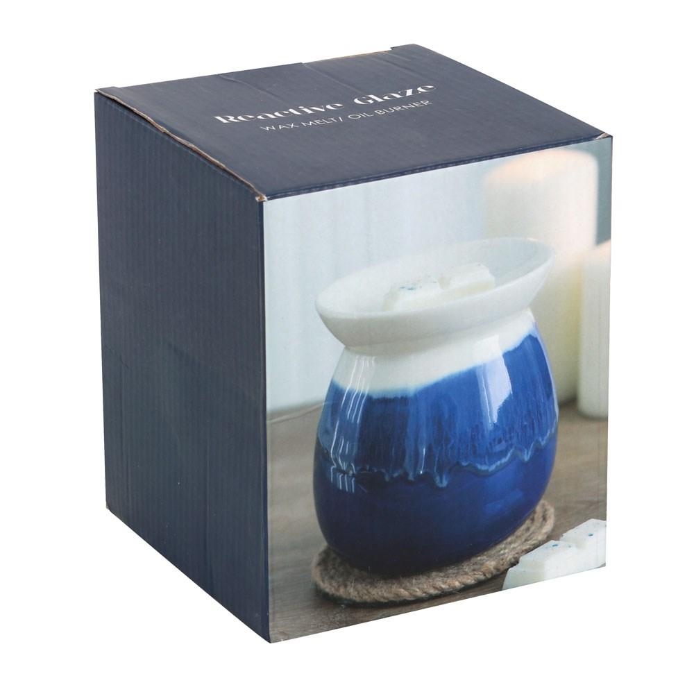 Blue and white reactive glaze oil burner and wax warmer, shown in box.