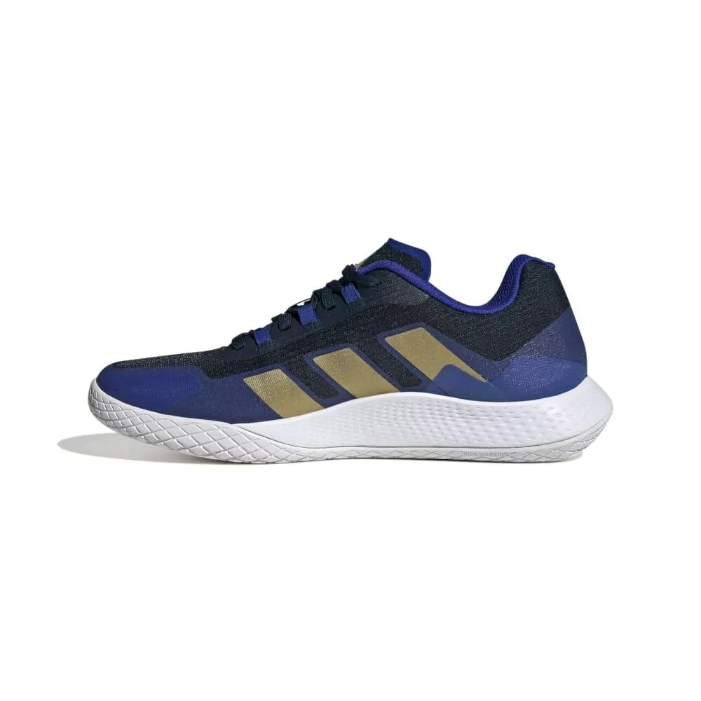 Blue adidas trainer side view