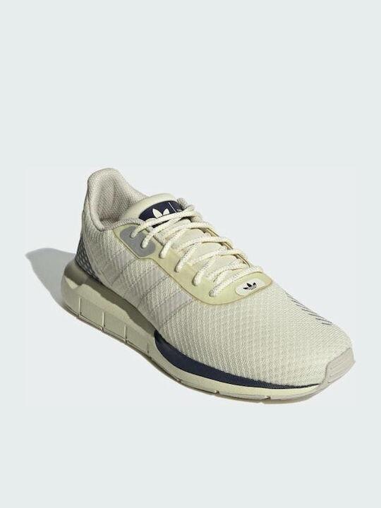 light brown adidas training with logo