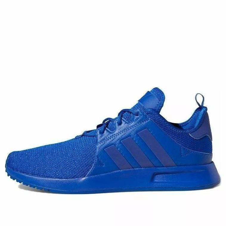 blue adidas trainer side view