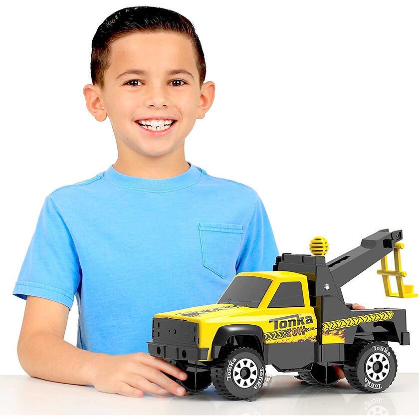 LIttle Boy Playing With Tonka Steel Classics - Tow Truck