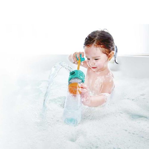 Girl playing with Hape Multi-Spout Sprayer