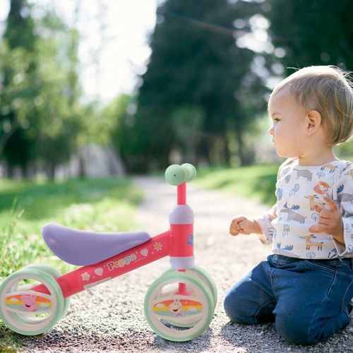 Child sitting by ride on