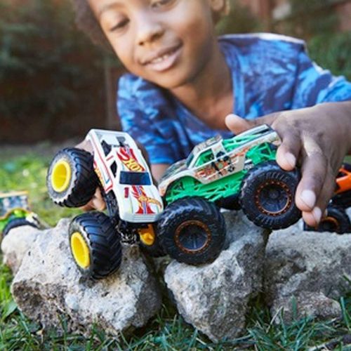 Child playing with cars