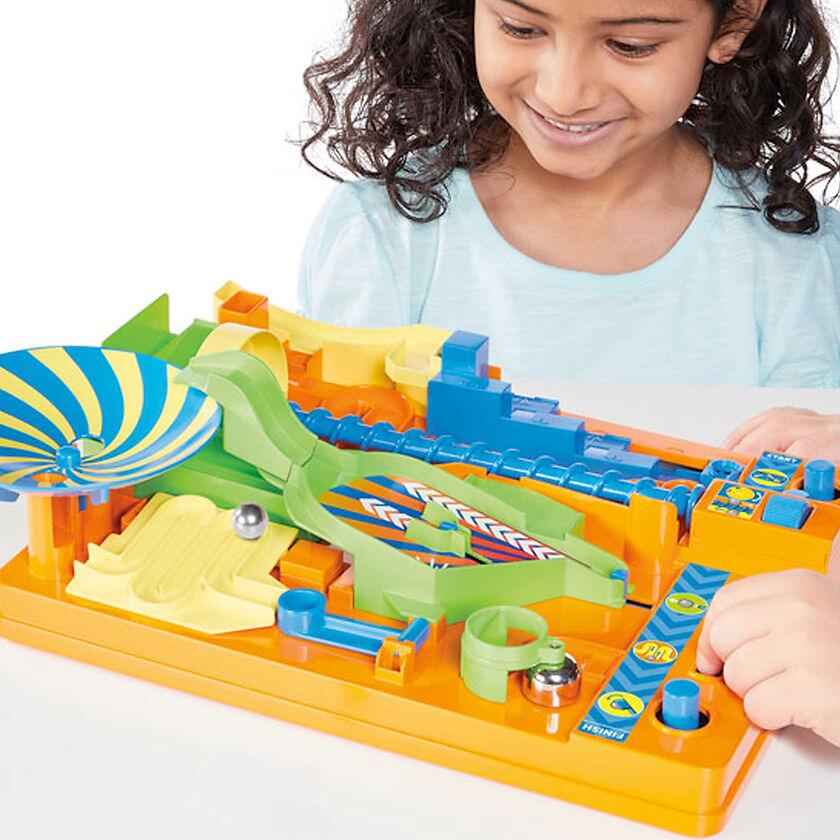 Little Girl Playing With Screwball Scramble 2 Game