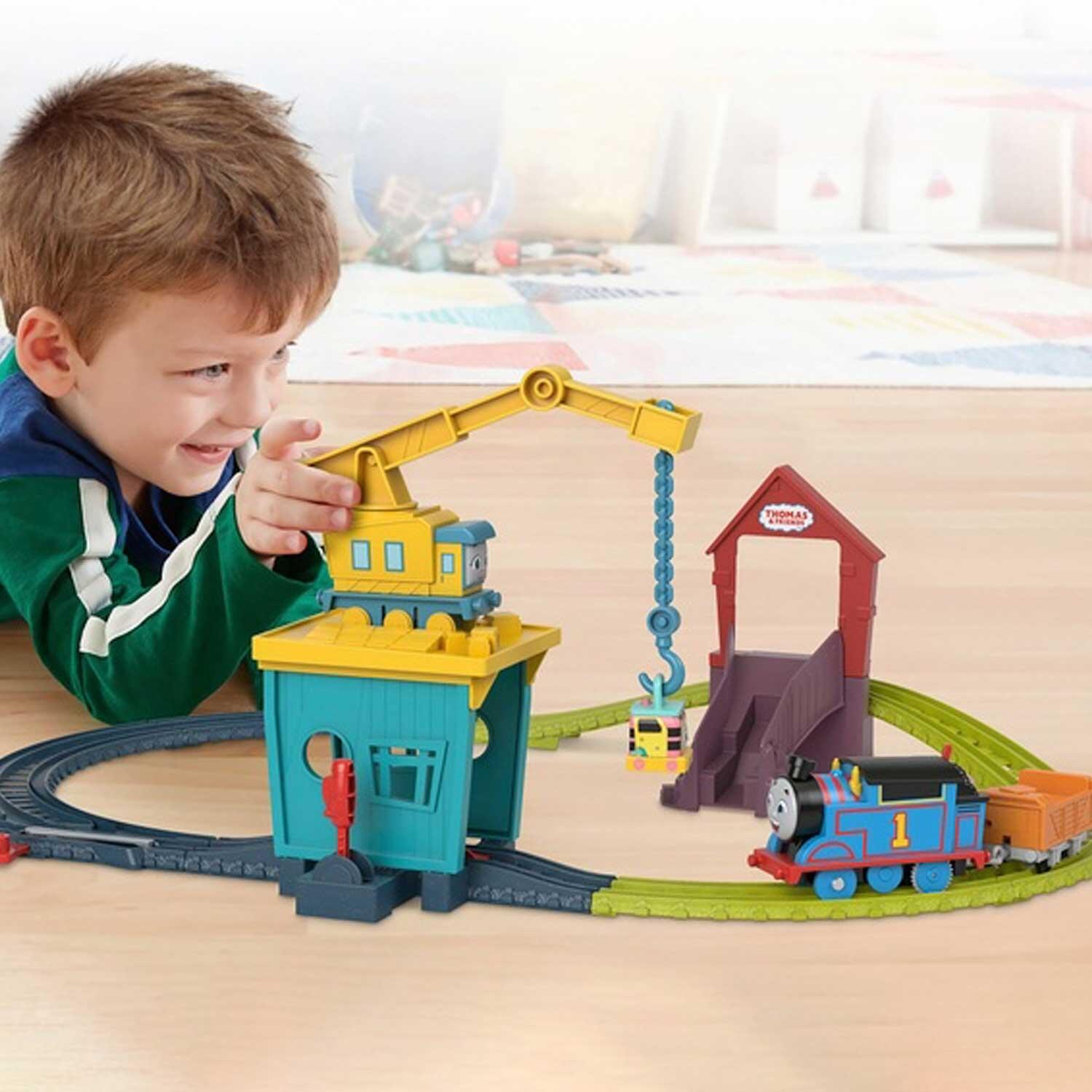 Little Boy Playing With Thomas And Friends Fix 'Em Up Friends Train Set