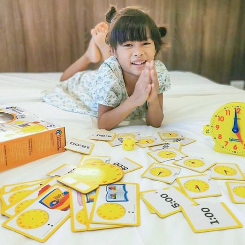 Child playing with card games
