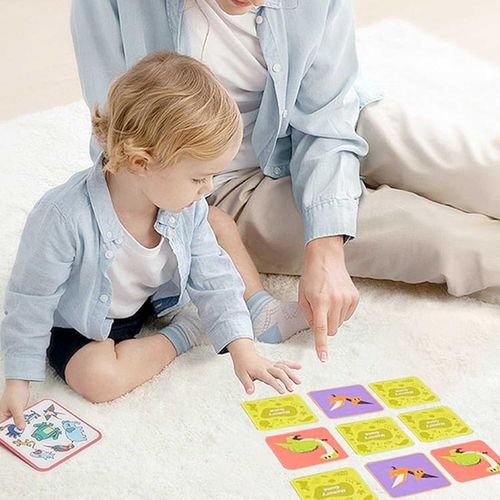 Child playing with a memory game