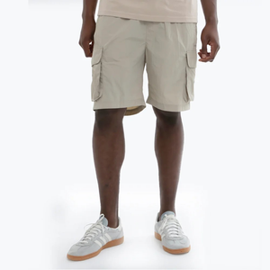 Peaceful Hooligan Sonic Shorts in stone – crinkle nylon water-resistant cargo shorts with zip pockets