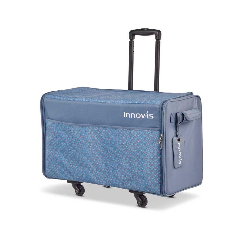 V series machine  blue trolley bag on wheels with pull out handle