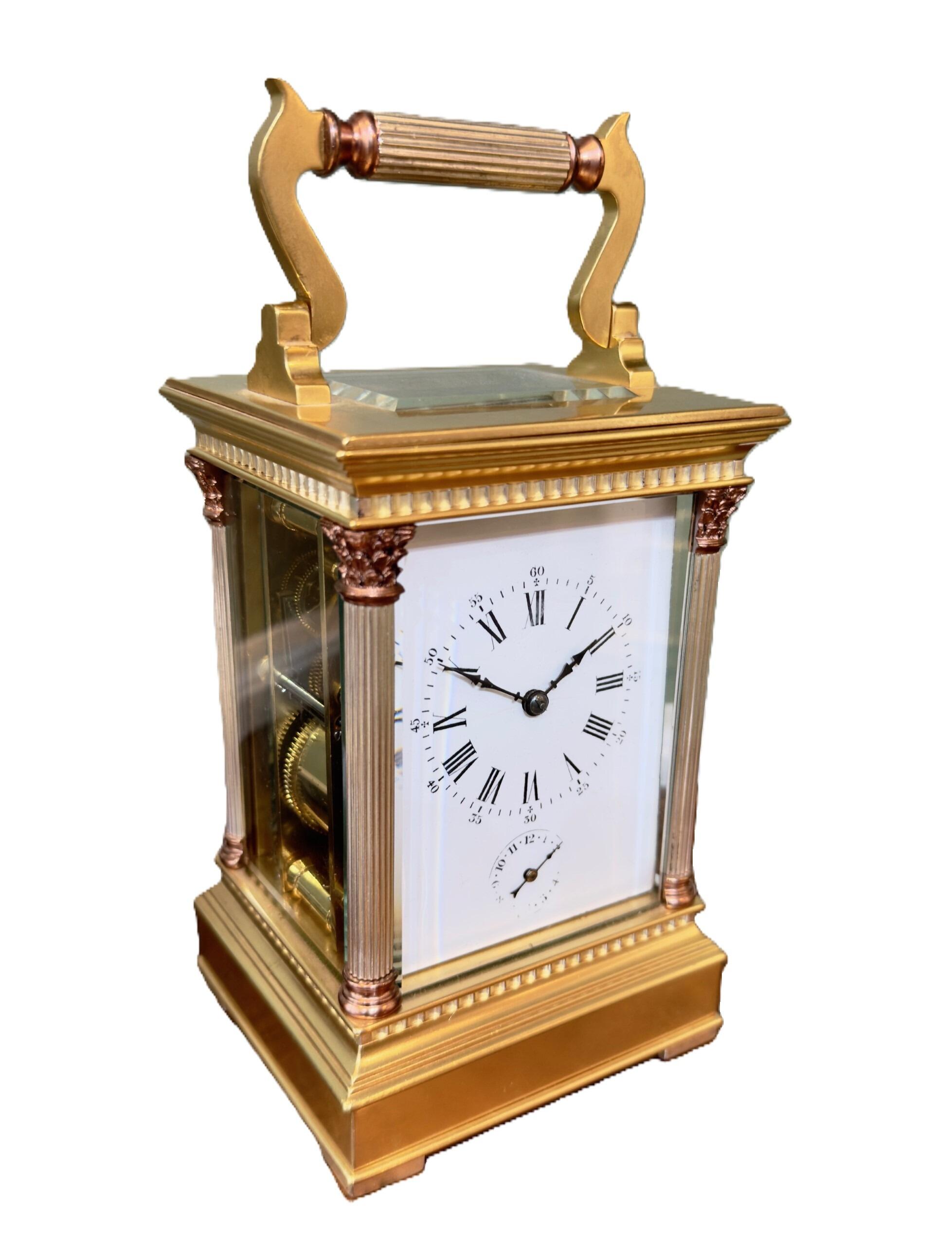 French gilded and silvered striking carriage clock with white dial