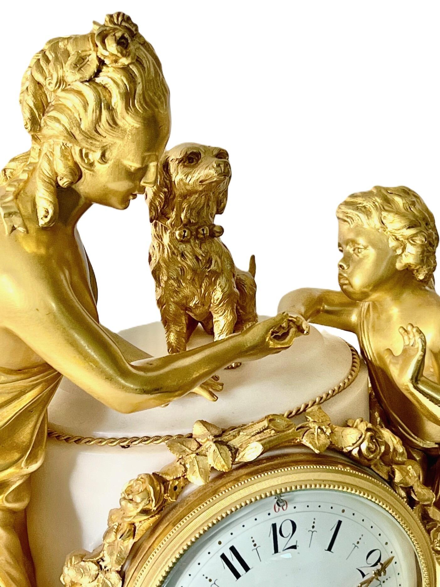 Antique French ormolu and white marble mantel clock with white enamel dial and figure of Cupid and Psyche