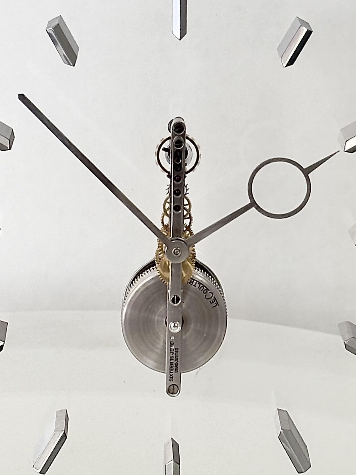 Nickel silver mid Century desk clock by Jaeger LeCoultre with skeletonised movement dial detail