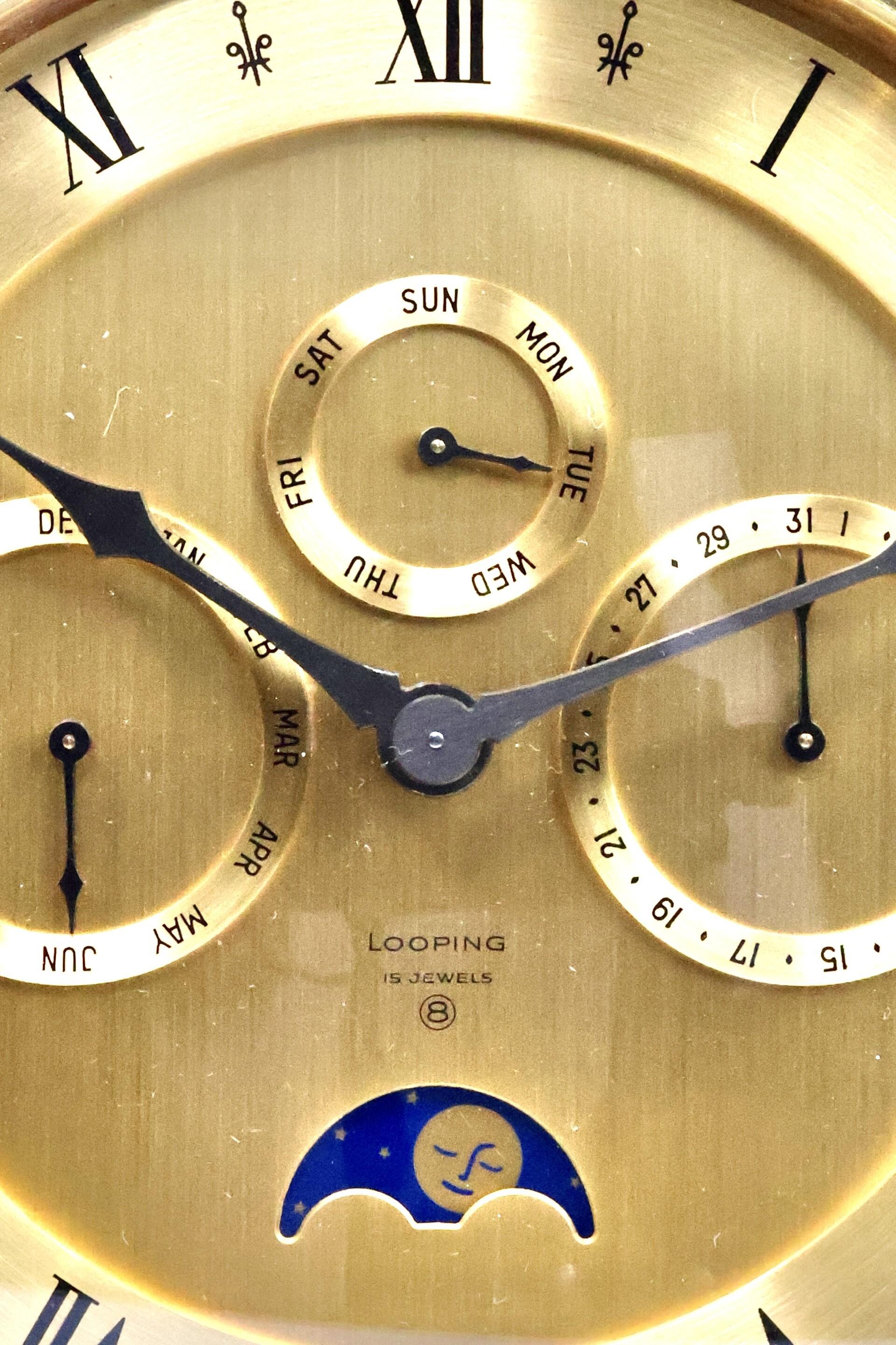 A Swiss Looping Mid Century Articulated Eight Day Desk Compendium