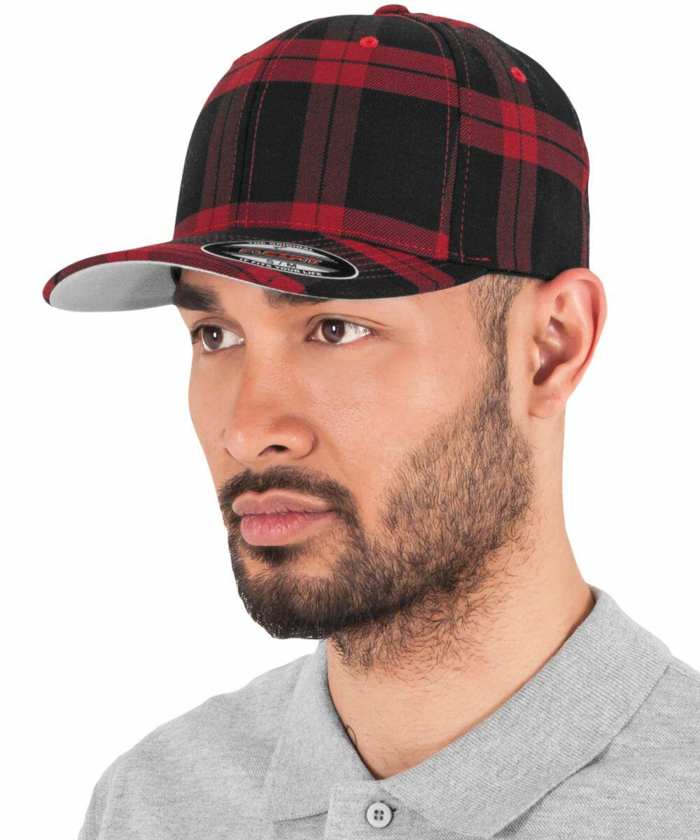 A man wearing a red and black plaid YP042 by Flexfit By Yupoong and a gray polo shirt.
