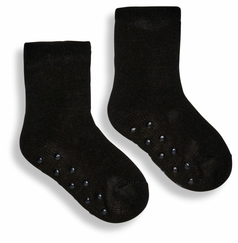 A pair of Ribbon RI009 black socks featuring rubber grips on the soles, shown against a white background.