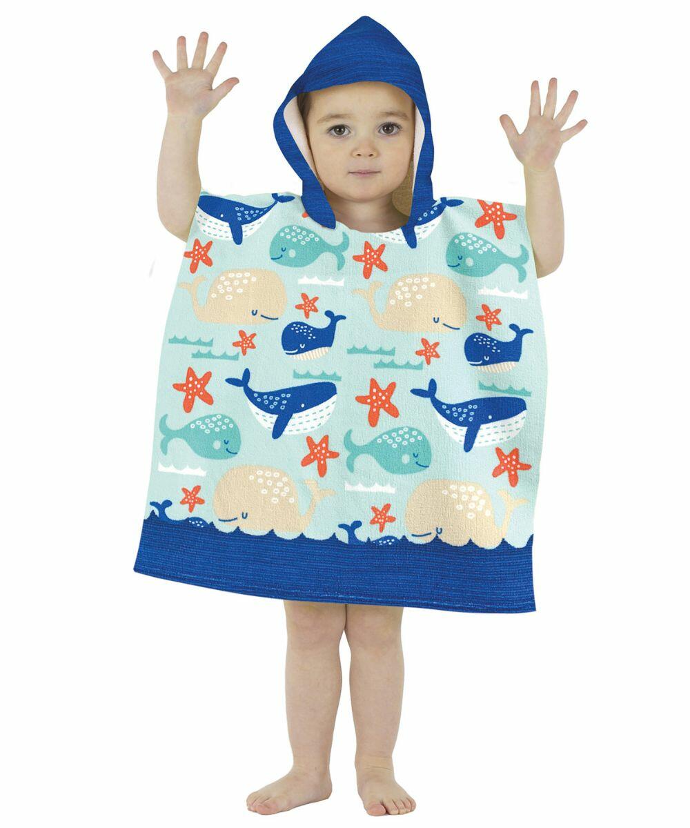 A child wearing a Home & Living HL007 hooded towel with blue trim and a marine pattern featuring whales, fish, and starfish, raises their arms.