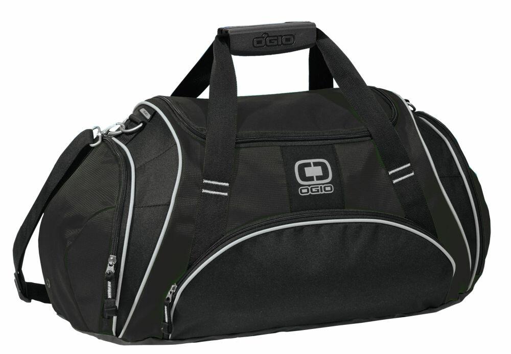 An OG011 duffel bag in black, showcasing the Ogio brand logo on the side, includes a main compartment, several zippered pockets, and a shoulder strap.