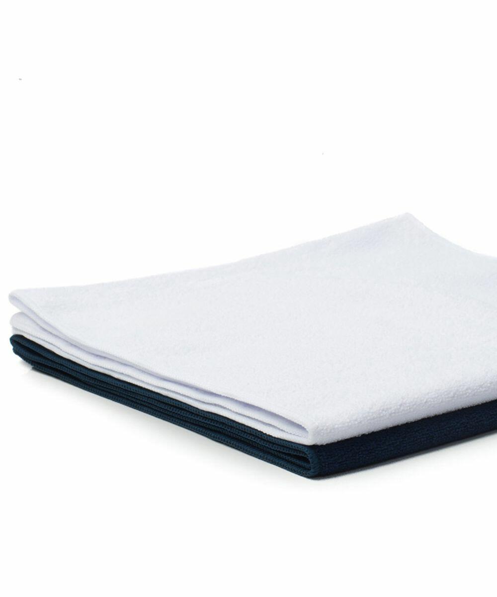 A neatly folded stack of two towels, with a white TC017 by Towel City towel on top of a dark blue TC017 by Towel City towel.