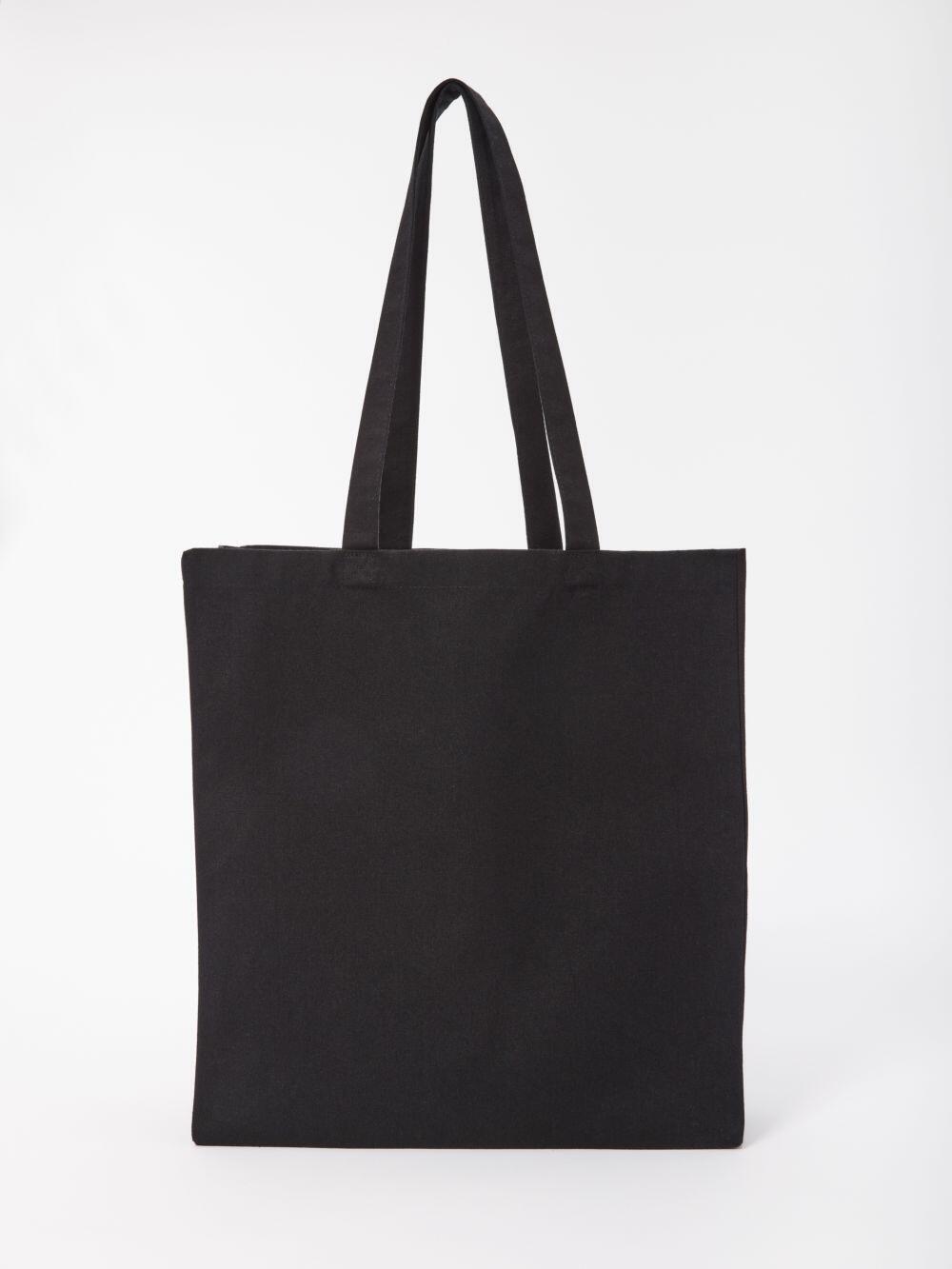 A Nutshell RL670 tote bag in plain black with long handles against a white background.