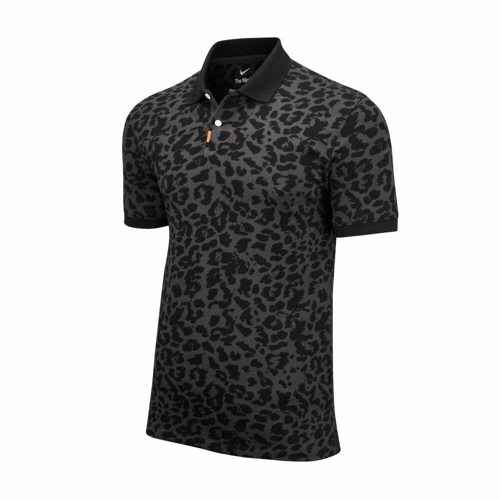 Nike's NK336 is a polo shirt featuring a black and gray leopard print, complemented by a black collar and short sleeves.