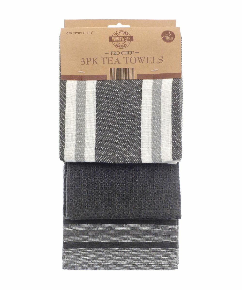 Three-pack of Home & Living HL200 tea towels in different gray shades and patterns, packaged in a cardboard holder.