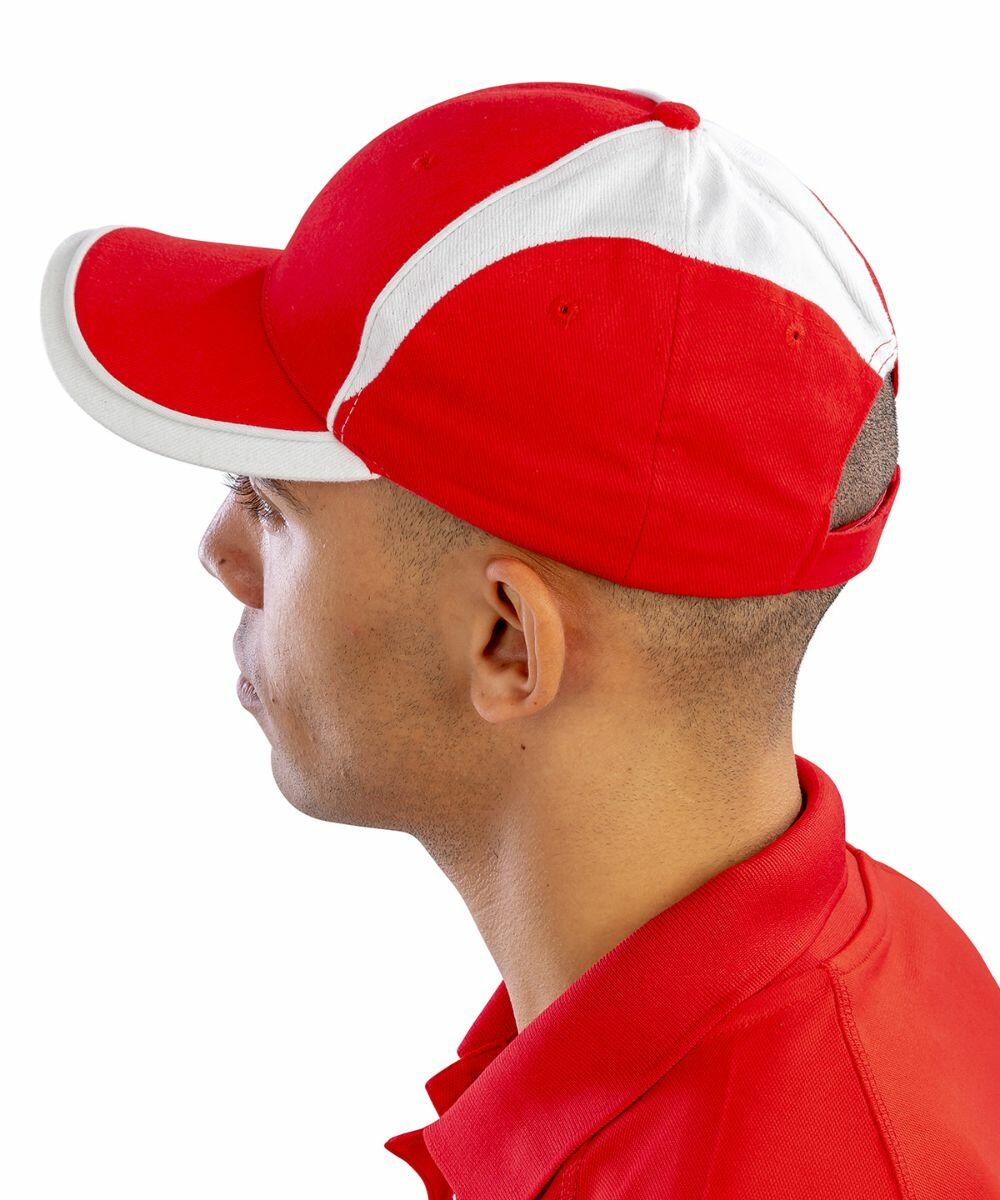 Side profile of a person wearing a red and white baseball cap and a red collared shirt (RC62X by Result) against a white background.