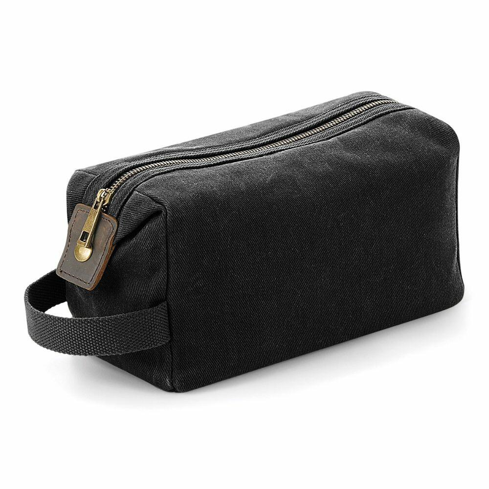 A Quadra QD651 black rectangular toiletry bag featuring a zipper and a side handle.