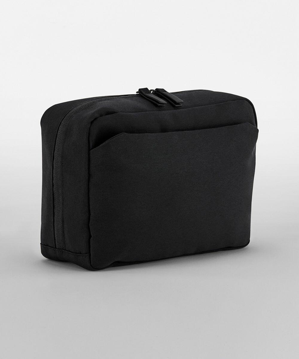 A black rectangular travel toiletry bag with zippered compartments and a front pocket displayed against a plain white background is the Quadra QD272.
