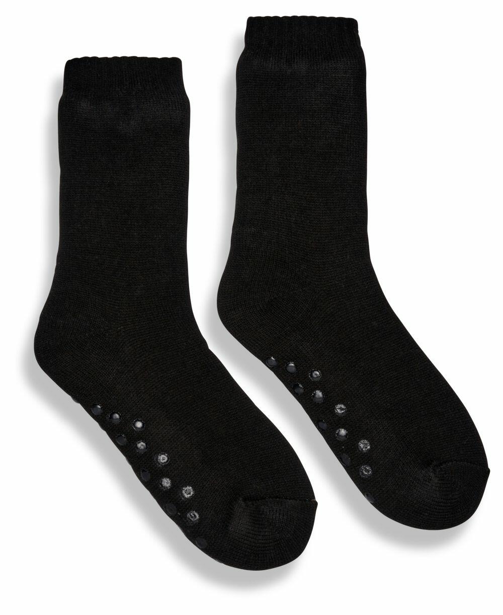 A pair of Ribbon RI008 black socks with non-slip grips on the soles.