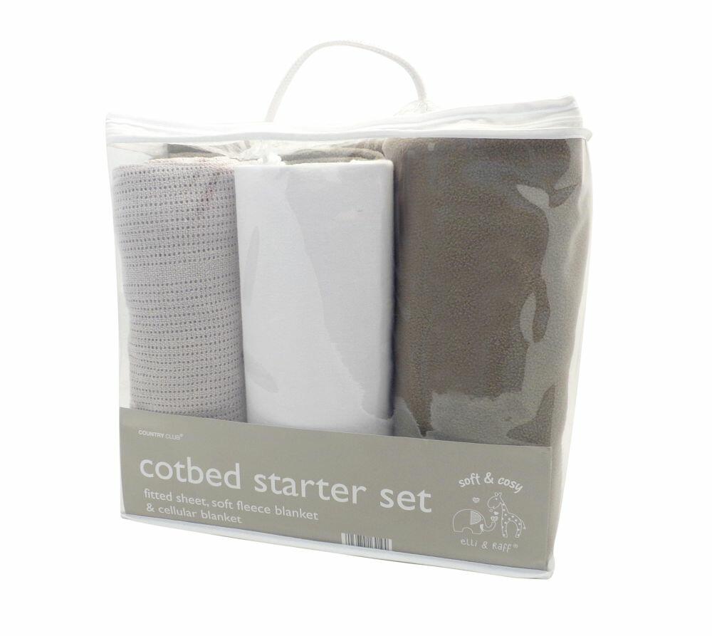 The Home & Living HL180 includes a complete cotbed starter set with a fitted sheet, a soft fleece blanket, and a cellular blanket in neutral tones.