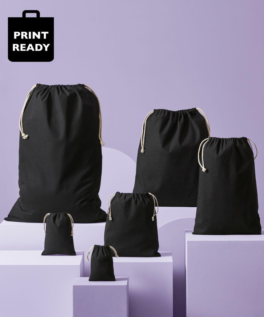 Six black drawstring bags of varying sizes are displayed on lavender platforms with a "Print Ready" graphic in the top left corner. The product shown is the RL700 by Nutshell.