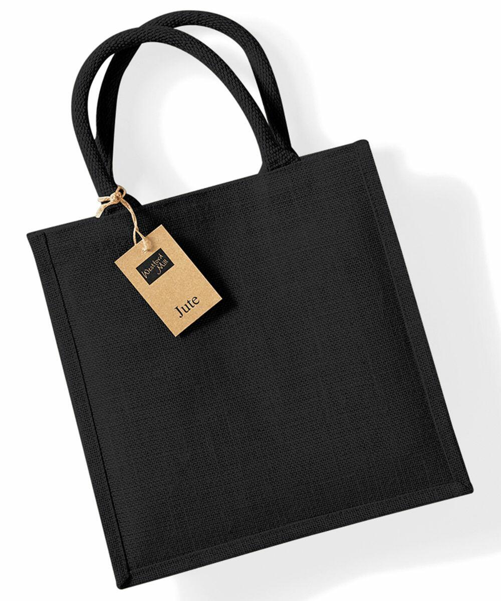 Black jute tote bag with two handles and a brown tag attached, Westford Mill WM413, against a white background.