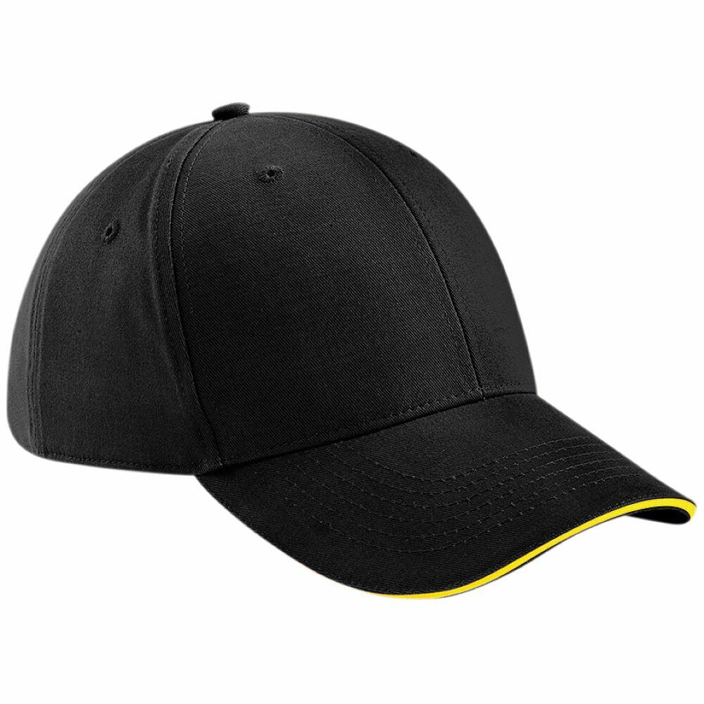 A Beechfield BC020 black baseball cap with a curved brim, accented by a subtle yellow trim along the edge. The cap is styled to display both the front and side panels.
