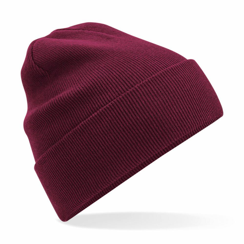 A Beechfield BC45N burgundy knit beanie with a folded brim is pictured against a white background. The beanie is angled slightly to the right, showcasing its texture and simple design.