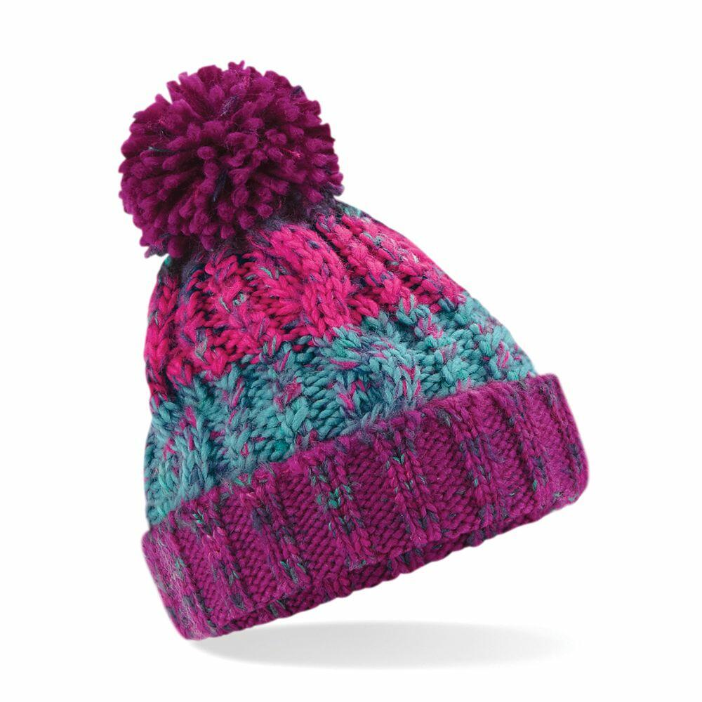 Product B486A by Beechfield is a colorful knitted winter hat featuring a large purple pom-pom on top. The hat showcases a vibrant mix of pink, blue, and purple patterns, perfect for enhancing any winter wardrobe.