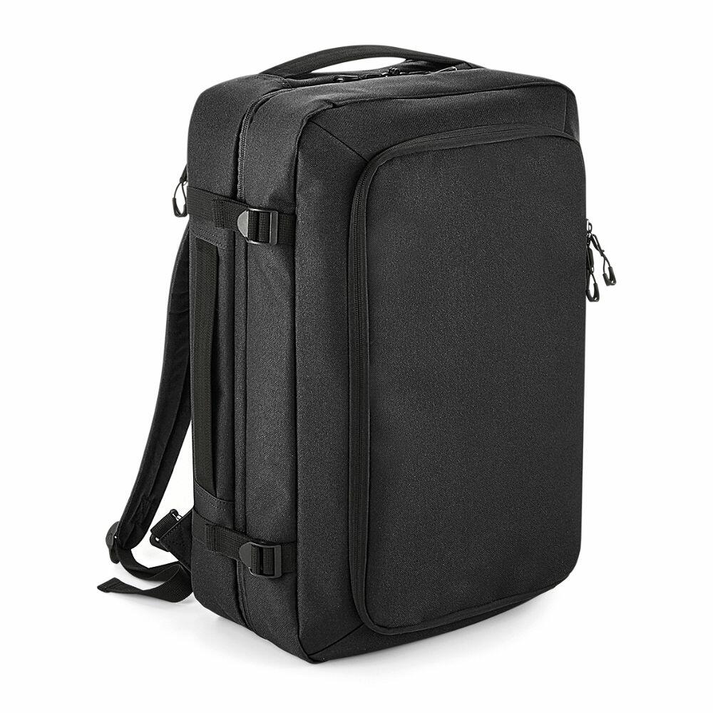 Bagbase BG480, a sleek black rectangular backpack featuring multiple zippers and a convenient handle on top.