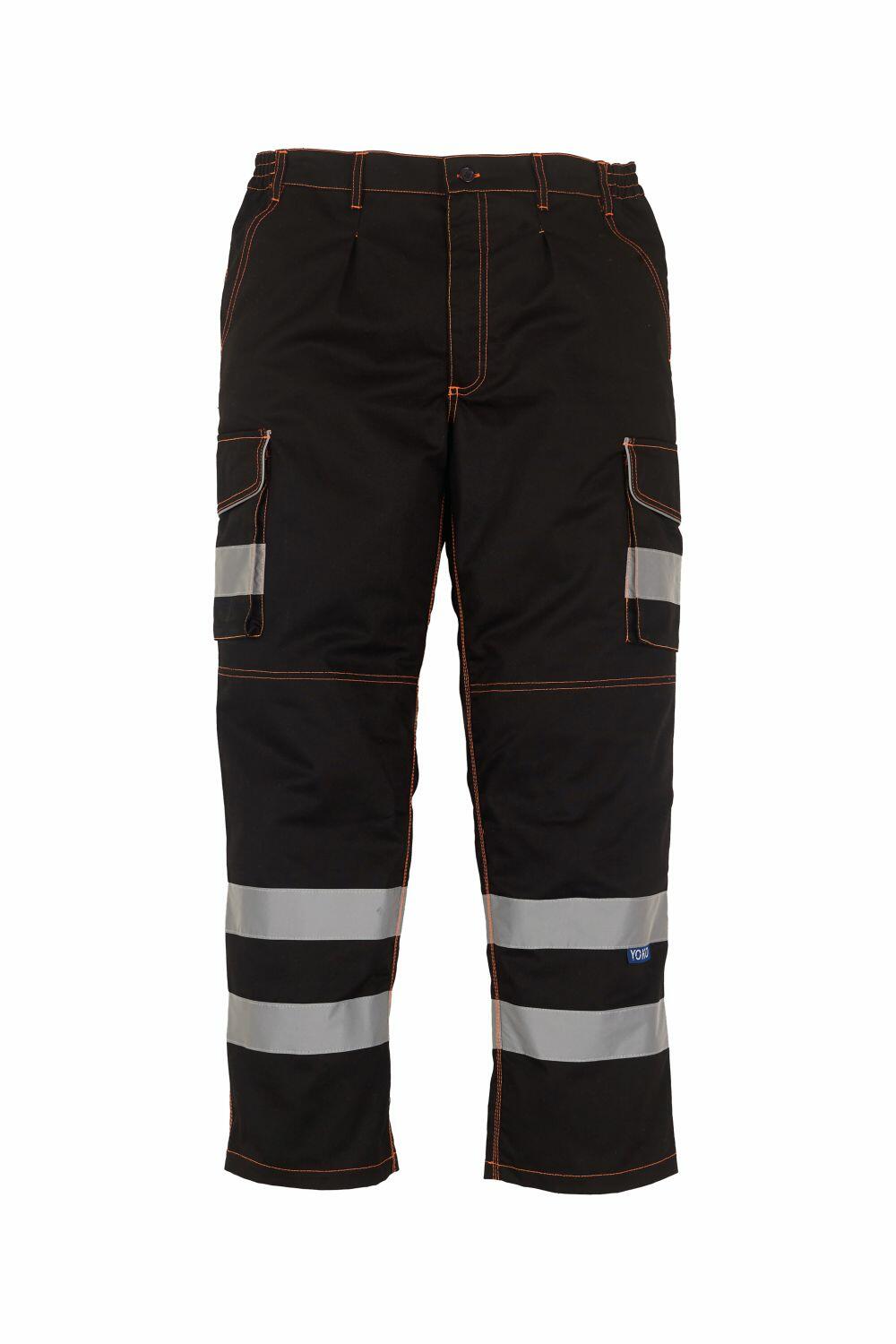 YK073 by Yoko are black cargo pants featuring reflective gray stripes positioned above and below the knees, complemented by pockets and seams outlined with orange stitching.