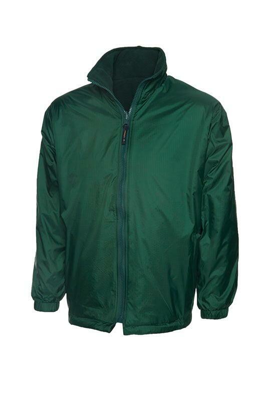 A Uneek UC606 childrens unisex classic reversable fleece jacket in Bottle Green